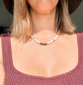 Collier Soléa - coquillage blanc & Hématite doré
