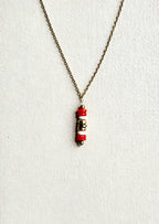 Talisman NÉRIA - coquillage corail rouge & coquillage blanc & hématite dorée